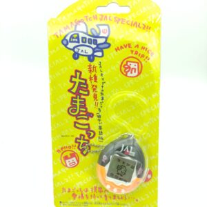 Tamagotchi Original P2 JAL Black w/ orange Bandai 1997 Boutique-Tamagotchis