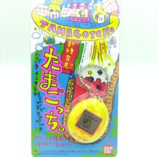 Tamagotchi Original P1/P2 Yellow w/orange Bandai 1997 boxed