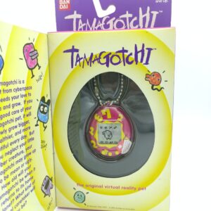 Tamagotchi Original P1/P2 purple w/ yellow Bandai 1997 English Boutique-Tamagotchis 6