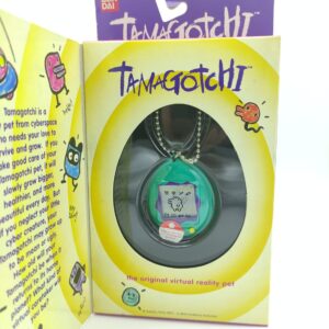 Tamagotchi Original P1/P2 purple w/ blue Bandai 1997 English Boutique-Tamagotchis 5