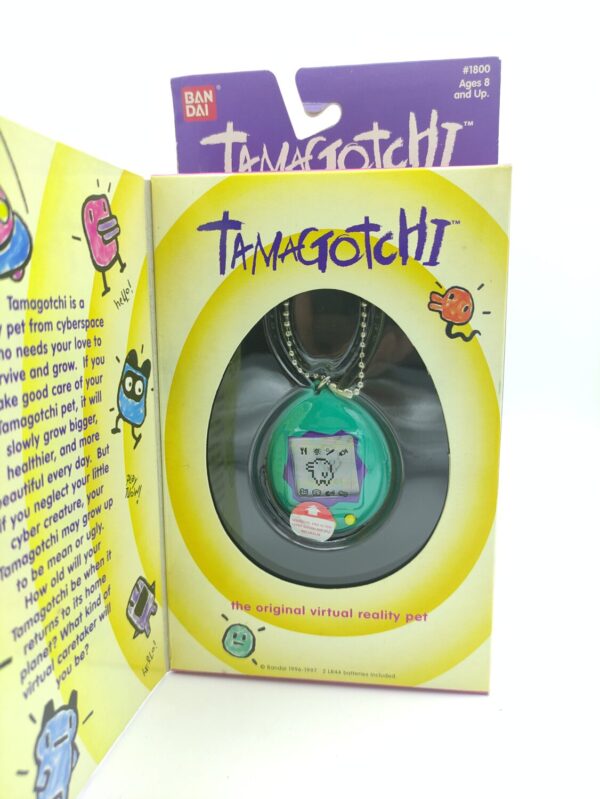 Tamagotchi Original P1/P2 green w/ blue Bandai 1997 English Boutique-Tamagotchis 2