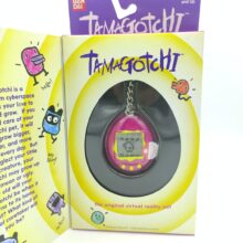 Tamagotchi Original P1/P2 purple w/ yellow Bandai 1997 English