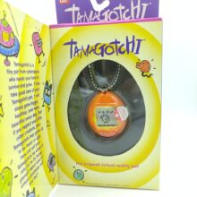 Tamagotchi Original P1/P2 orange w/ yellow Bandai 1997 English