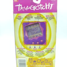 Tamagotchi Original P1/P2 orange w/ yellow Bandai 1997 English 2