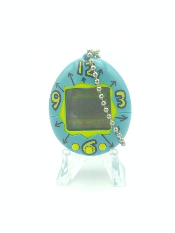 Tamagotchi Original P1/P2 Teal w/ yellow Bandai Japan 1997 Boutique-Tamagotchis 2