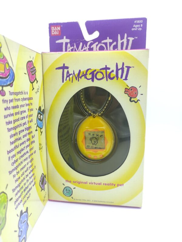 Tamagotchi Original P1/P2 Yellow w/orange Bandai 1997 Boutique-Tamagotchis 2