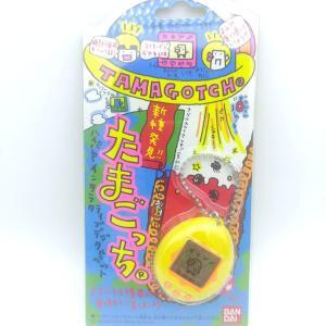 Tamagotchi Original P1/P2 Yellow w/orange Bandai 1997 boxed Boutique-Tamagotchis