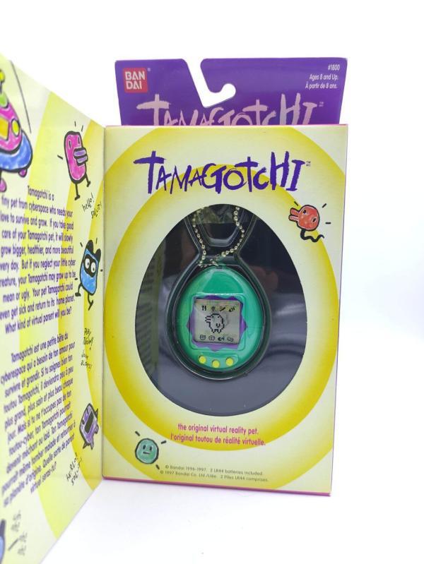 Tamagotchi Original P1/P2 green w/ blue Bandai 1997 English Boutique-Tamagotchis 2