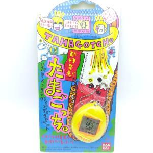 Tamagotchi Original P1/P2 Yellow w/orange Bandai 1997 boxed Boutique-Tamagotchis