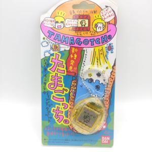 Tamagotchi Original P1/P2 clear yellow Bandai 1997 Boutique-Tamagotchis