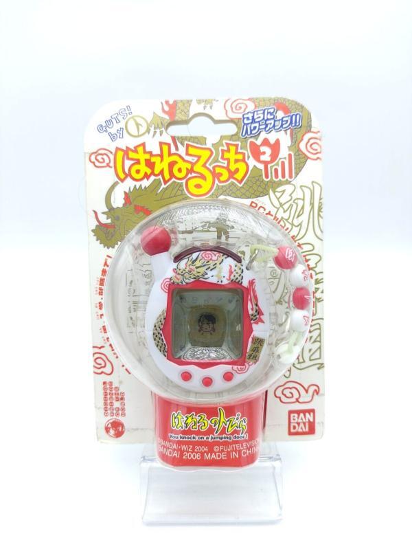 Tamagotchi Chou Jinsei Enjoi Hanerutchi 2 White w/ Red Boutique-Tamagotchis 2