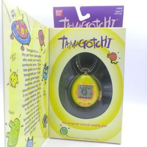 Tamagotchi Original P1/P2 Yellow w/orange Bandai 1997 Boutique-Tamagotchis