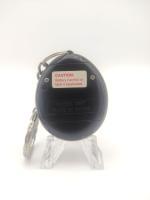 Tamagotchi Original P1/P2 black camo Bandai 1997 English Boutique-Tamagotchis 4