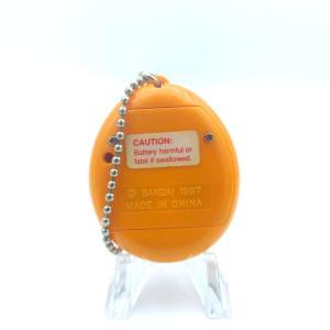 Tamagotchi Original P1/P2 orange w/ yellow Bandai 1997 English Boutique-Tamagotchis 2