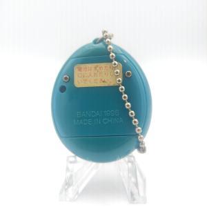 Tamagotchi Original P1/P2 Teal w/ yellow Bandai Japan 1997 Boutique-Tamagotchis 2