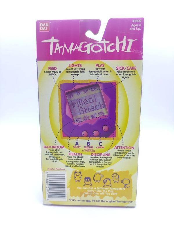 Tamagotchi Original P1/P2 green w/ yellow Bandai 1997 English Boutique-Tamagotchis 4