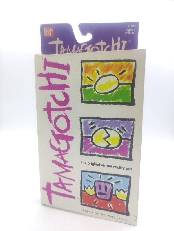 Tamagotchi Original P1/P2 white w/ blue Bandai 1997 English Boutique-Tamagotchis 3