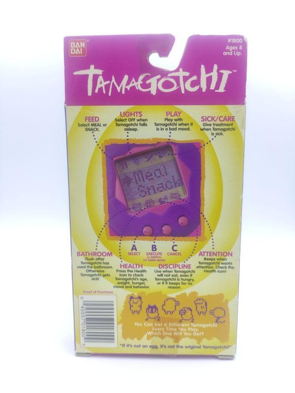 Tamagotchi Original P1/P2 white w/ blue Bandai 1997 English Boutique-Tamagotchis 4