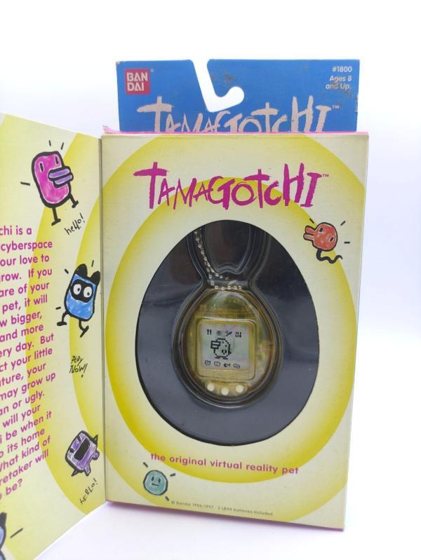 Tamagotchi Original P1/P2 clear yellow Bandai 1997 enslish Boutique-Tamagotchis 2