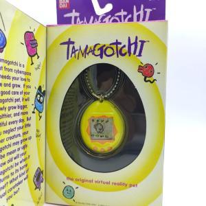 Tamagotchi Original P1/P2 Yellow w/orange Bandai 1997 Boutique-Tamagotchis