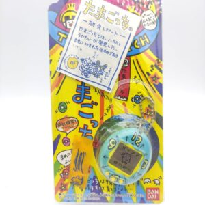 Tamagotchi Original P1/P2 Teal w/ yellow Bandai Japan 1997 Boutique-Tamagotchis