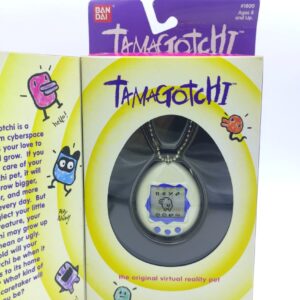 Tamagotchi Original P1/P2 white w/ blue Bandai 1997 English Boutique-Tamagotchis