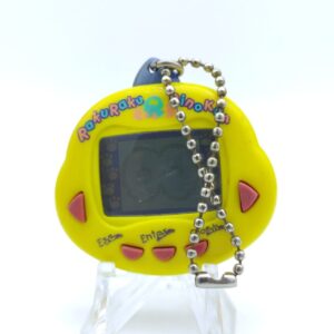 RakuRaku Dinokun Dinkie Dino Pocket Game Virtual Pet Yellow