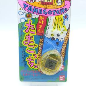 Tamagotchi Original P1/P2 clear yellow Bandai 1997 Boutique-Tamagotchis