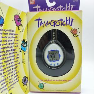 Tamagotchi Original P1/P2 white w/ blue Bandai 1997 English Boutique-Tamagotchis