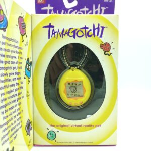 Tamagotchi Original P1/P2 Yellow w/ orange Bandai 1997 Boutique-Tamagotchis