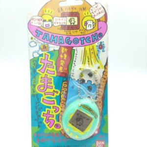 Tamagotchi Original P1/P2 Teal w/ yellow Bandai Japan 1997
