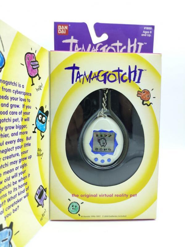 Tamagotchi Original P1/P2 white w/ blue Bandai 1997 English Boutique-Tamagotchis 2