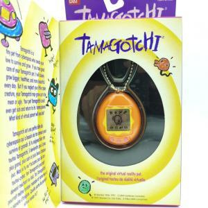 Tamagotchi Original P1/P2 orange w/ yellow Bandai 1997 English Boutique-Tamagotchis