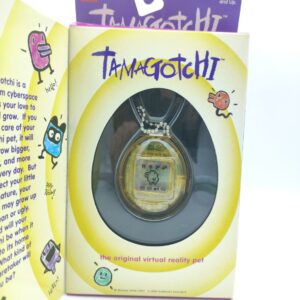 Tamagotchi Original P1/P2 clear yellow Bandai 1997 Boutique-Tamagotchis Tamagotchi Original P1/P2 clear yellow Bandai 1997 Boutique-Tamagotchis