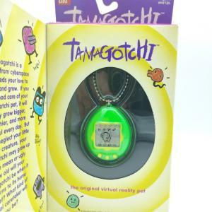 Tamagotchi Original P1/P2 Green w/ yellow Original Bandai 1997 Boutique-Tamagotchis Tamagotchi Original P1/P2 Green w/ yellow Original Bandai 1997 Boutique-Tamagotchis