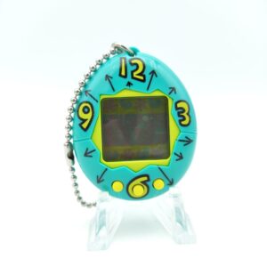 Tamagotchi Original P1/P2 Teal w/ yellow Bandai Japan 1997 Boutique-Tamagotchis